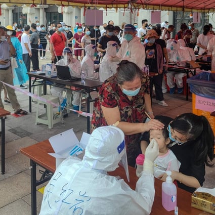Across Fujian province, 60 new infections were reported on Monday, bringing the total number to 135. Photo: AFP