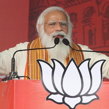 Modi speaks to supporters during a campaign rally in April. Photo: TNS