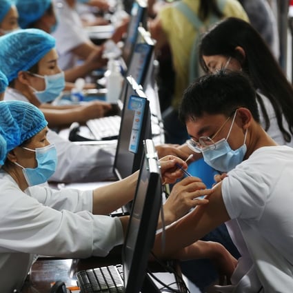 A senior health official says China leads the world in coronavirus vaccine doses given and the number of people covered. Photo: DPA