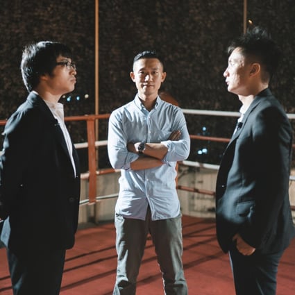 Hong Kong professional boxer Edwin Ng Ka-ho (centre) between We Are Champs amateur fighters Joseph Lam Chok and Derek Cheung ahead of their boxing bout. Photo: We Are Champs