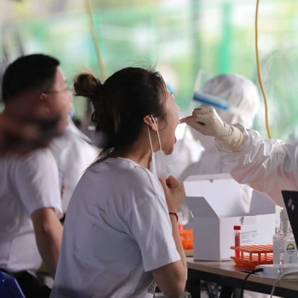 Nucleic acid testing for Covid-19 under way on Saturday in Xiamen, Fujian province. The city reported 39 new locally transmitted cases. Photo: AFP