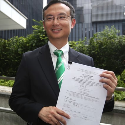 Dr Pierre Chan submits his application to run in the Legislative Council elections in 2016. Photo: Edward Wong