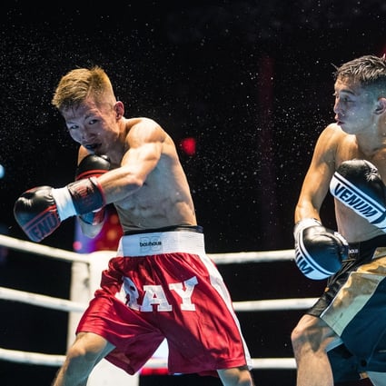 Hong Kong boxer Raymond Poon Kai-ching in his win against multiple national Muay Thai champion Dylan Yiu Tat-fai at the We Are Champs in Star Hall in Kowloon Bay. Photo: We Are Champs
