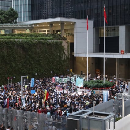 Protesters gather for a forum decrying Hong Kong’s Lantau Tomorrow Vision development plan outside government offices in 2018. Photo: Edward Wong