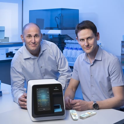 Eran Eden, (right) co-founder and CEO of MeMed and Kfir Oved, co-founder and CTO, with their company’s MeMed BV blood test kit. Photo: Handout