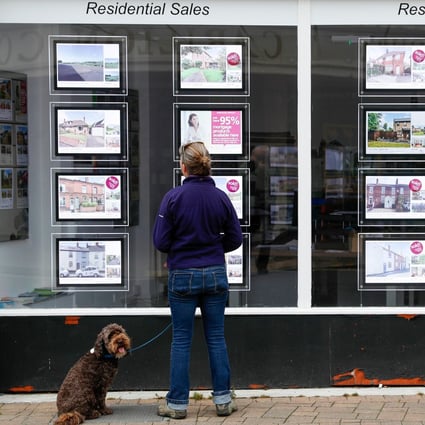Residential sales in the window of an property agent in Loughborough in the United Kingdom on Monday, July 5, 2021. Photo: Bloomberg.