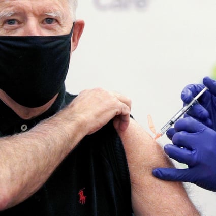 US President Joe Biden receives a dose of Covid-19 vaccine in January. Photo: Reuters