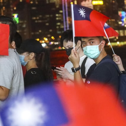 Hong Kong protesters wave the Taiwanese flag in Tsim Sha Tsui in celebration of Double Tenth Day in 2019. Photo: Dickson Lee