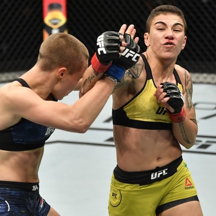 Jessica Andrade punches Rose Namajunas in their strawweight rematch at UFC 251. Photo: USA Today