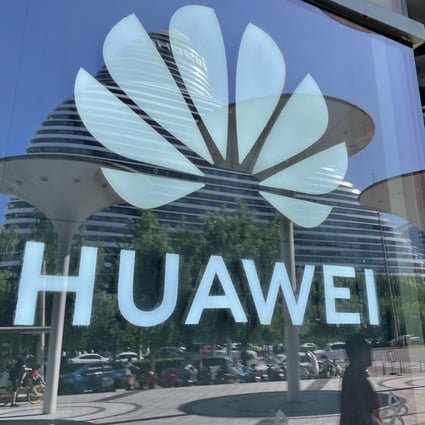 A Huawei logo is pictured on the glass wall of a shopping mall in Beijing, China. Photo: Simon Song