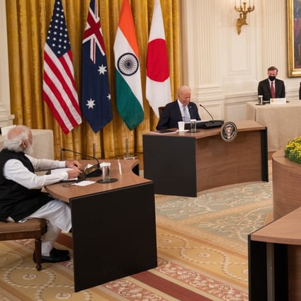 US President Joe Biden hosts a Quad leaders summit with India Prime Minister Narendra Modi (at left), Japan Prime Minister Suga Yoshihide and Australian Prime Minister Scott Morrison in the East Room at the White House in Washington on Friday. Photo: EPA-EFE