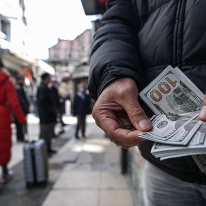 China’s central bank is keeping its domestic banking system awash with cash amid Evergrande’s debt pressure. Photo: EPA-EFE