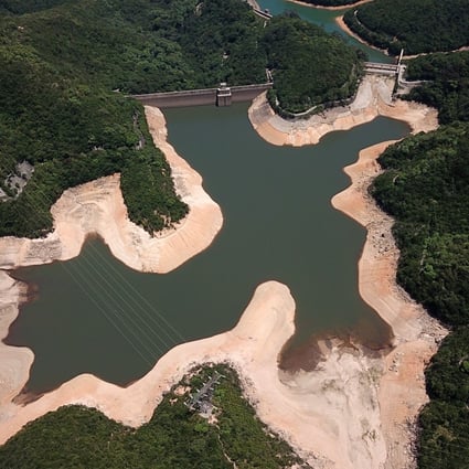 Low water level at Hong Kong’s Tai Tam Upper Reservoir amid an unprecedented heat wave on 29 May 2018, exposing the yellow earth of the reservoir bed. Photo: Winson Wong.