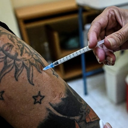 A health worker is inoculated with the Cuban Covid-19 vaccine Abdala in Havana. Photo: AFP