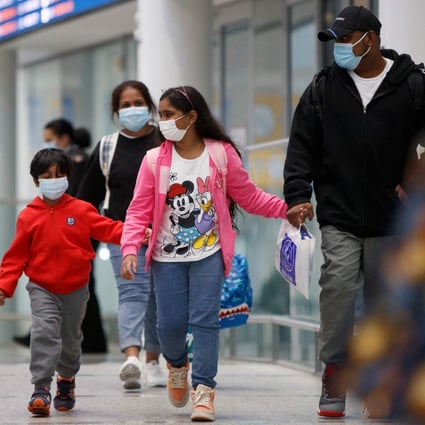Supun Thilina Kellapatha and his family arrive in Toronto, Canada, as refugees on September 28, 2021. Photo: AFP