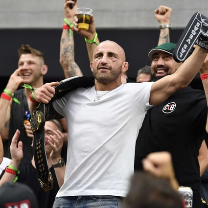 UFC featherweight champion Alexander Volkanovski cheers on the Las Vegas Raiders against the Miami Dolphins during the game at Allegiant Stadium. Photo: AFP