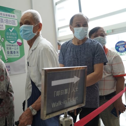 Residents queue up for vaccinations. Photo: Sam Tsang