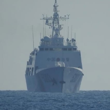 A Chinese coastguard ship sails along Whitsun Reef in the Spratly Islands in April. Malaysian officials have also complained about Chinese coastguard vessels loitering around the South Luconia Shoals off Sarawak. Photo: Philippine Coast Guard via EPA-EFE