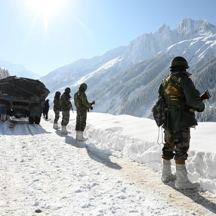 Indian army soldiers near a mountain pass connecting Srinagar to Ladakh, bordering China. Photo: AFP
