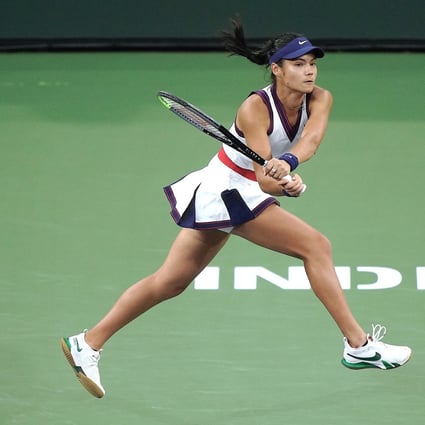 Emma Raducanu returns a shot to Alaksandra Sasnovich at the BNP Paribas Open tennis tournament at Indian Wells. Photo: AP