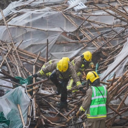 Firefighters search for people after scaffolding collapsed on Broadwood Road in Happy Valley. Photo: Felix Wong