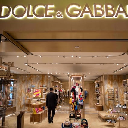 A man walks inside a Dolce & Gabbana shop in Beijing on November 22, 2018. Photo: Agence France-Presse