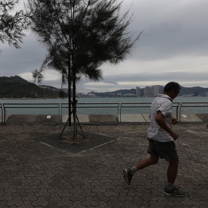 The Hong Kong Observatory is likely to raise the No 8 typhoon signal by late afternoon as Tropical Cyclone Kompasu bears down on the city. Photo: Xiaomei Chen