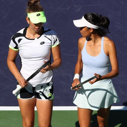 Taiwan’s Hsieh Su-wei (right) and Elise Mertens of Belgium confer while playing Bethanie Mattek-Sands and Iga Swiatek of Poland during the BNP Paribas Open at Indian Wells. Photo: AFP