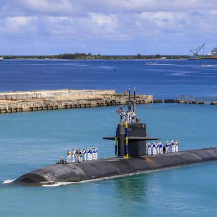 The Los Angeles-class fast attack submarine USS Oklahoma City returns to the US Naval Base in Guam. Photo: AP