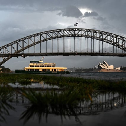 A ferry makes its way across the harbour in Sydney on Thursday. Photo: AFP