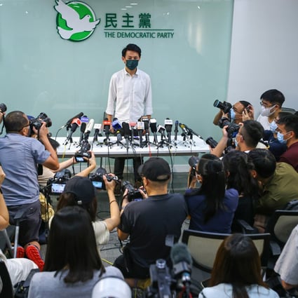 Democratic Party chairman Lo Kin-hei tells reporters no decision has been made on whether to contest the coming Legislative Council poll after a meeting last month. Photo: Dickson Lee