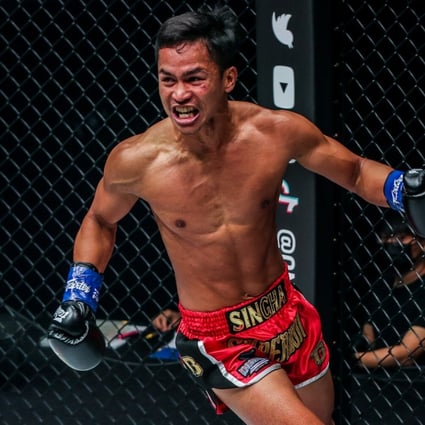 Superbon rings around the cage in celebration after knocking out Giorgio Petrosyan. Photo: ONE Championship