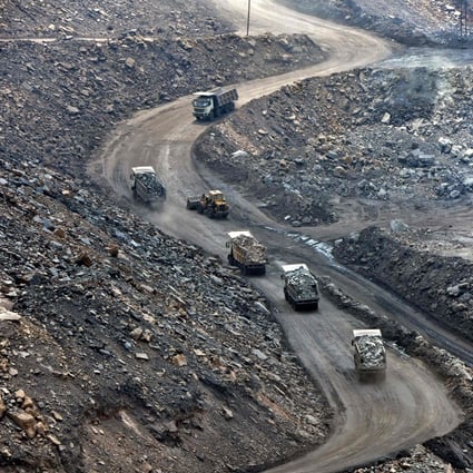 Trucks loaded with coal are seen at the Jharia coalfield in India’s Jharkhand state. Coal accounted for 70 per cent of India’s electricity generation in 2020. Photo: AFP