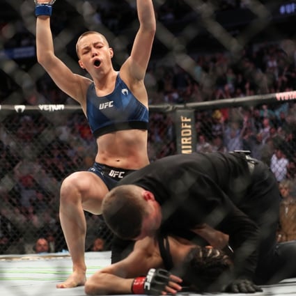 Rose Namajunas celebrates after beating Zhang Weili to win the strawweight title at UFC 261. Photos: AFP