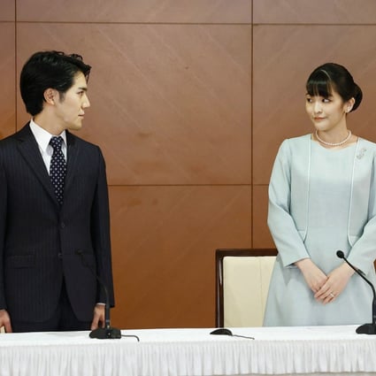 Former Japanese princess Mako and her husband Kei Komuro attend a news conference at a Tokyo hotel on Tuesday. Photo: AFP