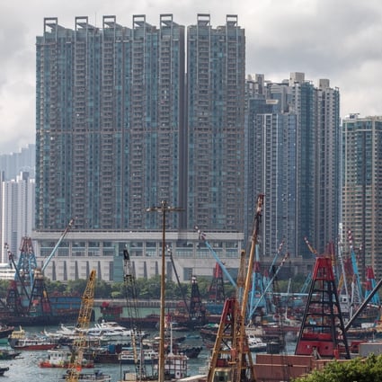 One SilverSea (left) and Island Harbourview residential complexes in Hong Kong. Lived-in home price prices are trending lower in the city. Photo: Bloomberg