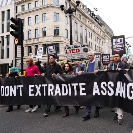 Supporters of WikiLeaks founder Julian Assange take part in a march in London on October 23, 2021. Photo: AP