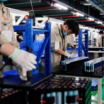 Employees work on the production line of electric vehicle (EV) battery manufacturer Octillion in Hefei, Anhui province, China, March 30, 2021. Photo: Reuters