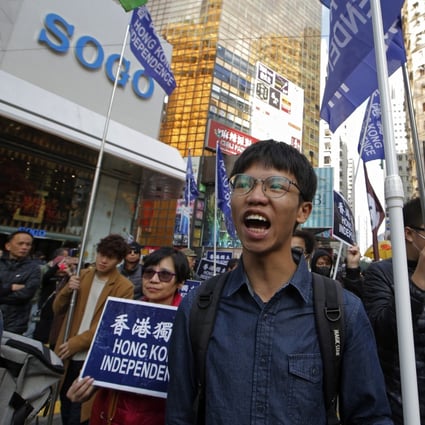 Tony Chung (left) pictured at a New Year’s Day protest in 2019. Photo: AP
