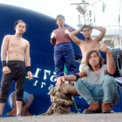 Indonesian Aji Proyogo died after jumping into the sea with Brando Brayend Tewuh in an attempt to escape the fishing boat. He is in the foreground with brown boots and longish hair. Photo: Handout