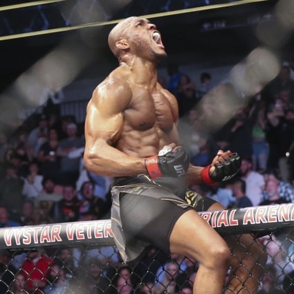 Kamaru Usman celebrates knocking out Jorge Masvidal at UFC 261. Photos: AP