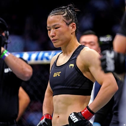 Zhang Weili looks on dejectedly as Rose Namajunas celebrates winning the strawweight title at 261. Photo: Jasen Vinlove/USA TODAY Sports