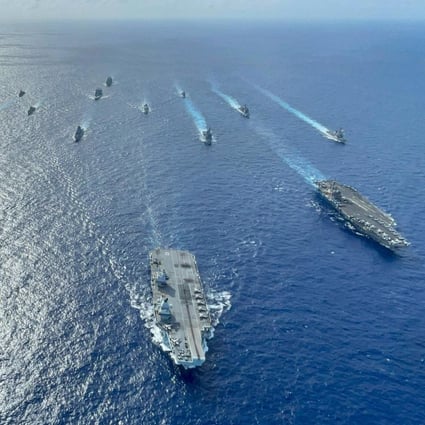 British, Japanese and US warships pictured during a carrier group excercise in the Philippine Sea. Photo: Handout