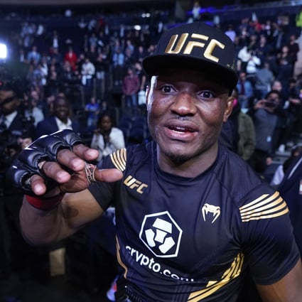 Kamaru Usman looks on from the Octagon after defeating Colby Covington in their welterweight title bout at UFC 268. Photos: AP