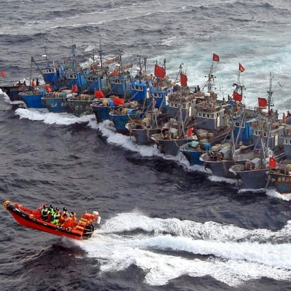 Chinese fishing boats band together to thwart an attempt by South Korean coastguard ships to stop their alleged illegal fishing off the coast of South Korea. Photo: AFP