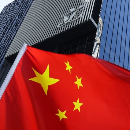 The Chinese flag flies in front of the Legislative Council building in Tamar. Photo: May Tse