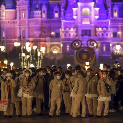 Visitors to the Shanghai Disneyland were caught up in China’s zero-Covid-19 approach, which the country’s top respiratory diseases expert Zhong Nanshan said last week was less costly than living with the disease. Photo: AP