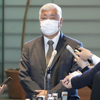 Gen Nakatani speaks to reporters at the PM’s office on November 8, 2021. Photo: Kyodo