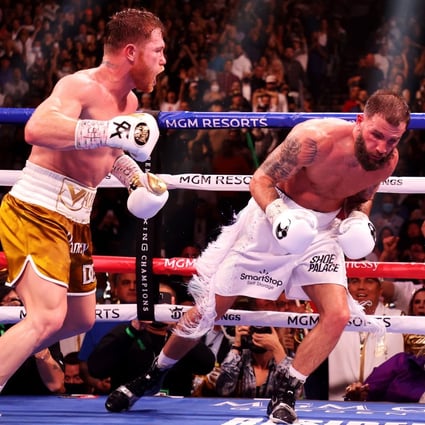 Canelo Alvarez punches Caleb Plant against the ropes during their championship bout. Photo: TNS