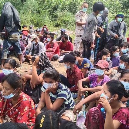 Myanmar migrants seen apprehended at the border with Thailand earlier this month. Photo: Royal Thai Army Handout via AFP
